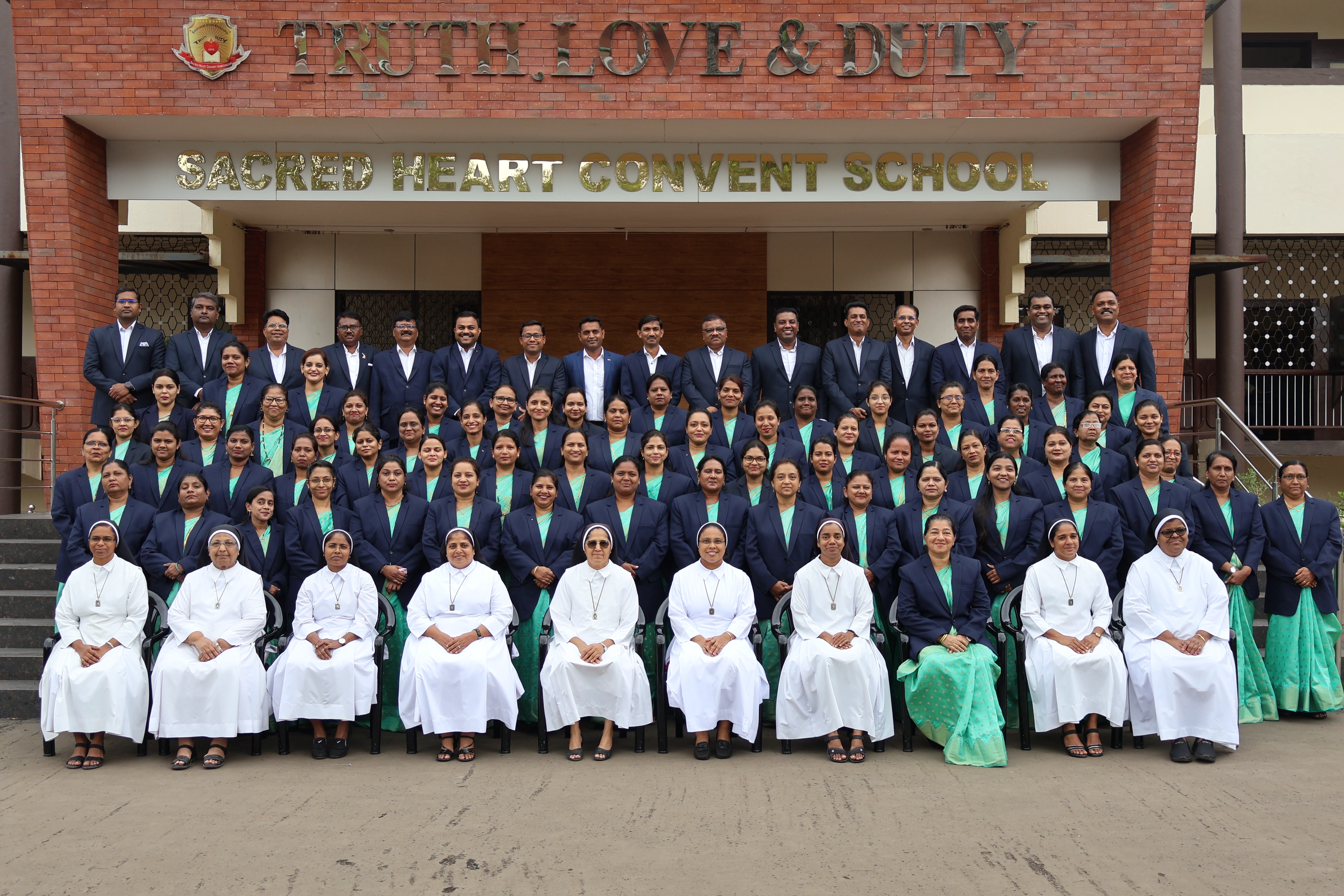 Sacred%20Heart%20Staff@0.5x